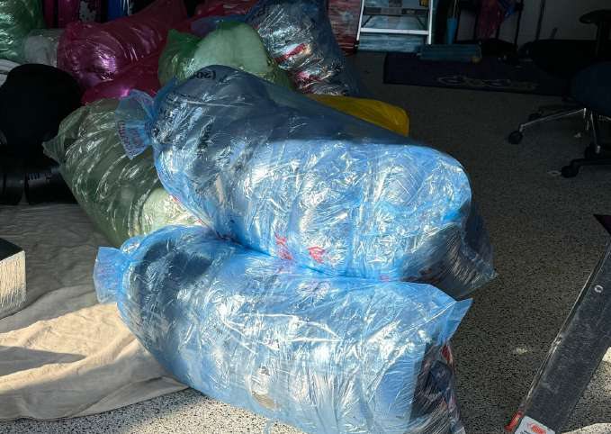 Bags of new flexible duct ready to install