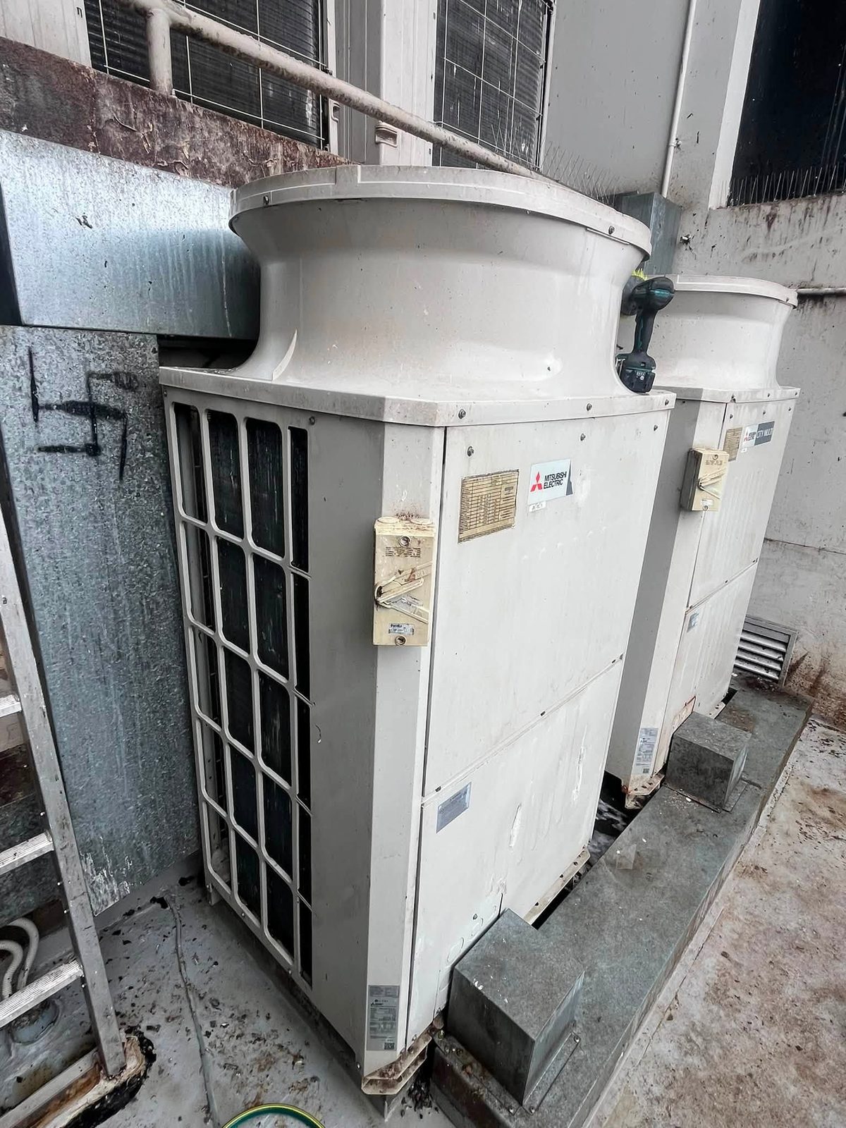 Bank of Mitsubishi Electric VRF units on a commercial plant deck, Geelong