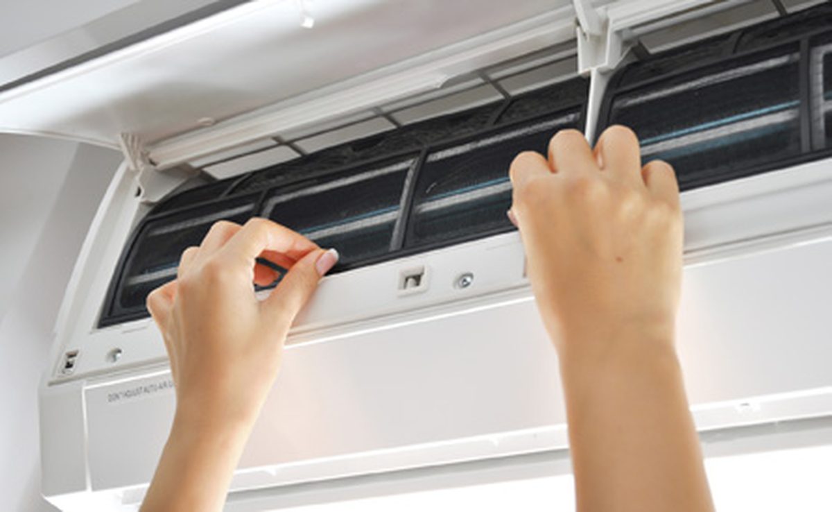 Technician commissioning a split system indoor unit